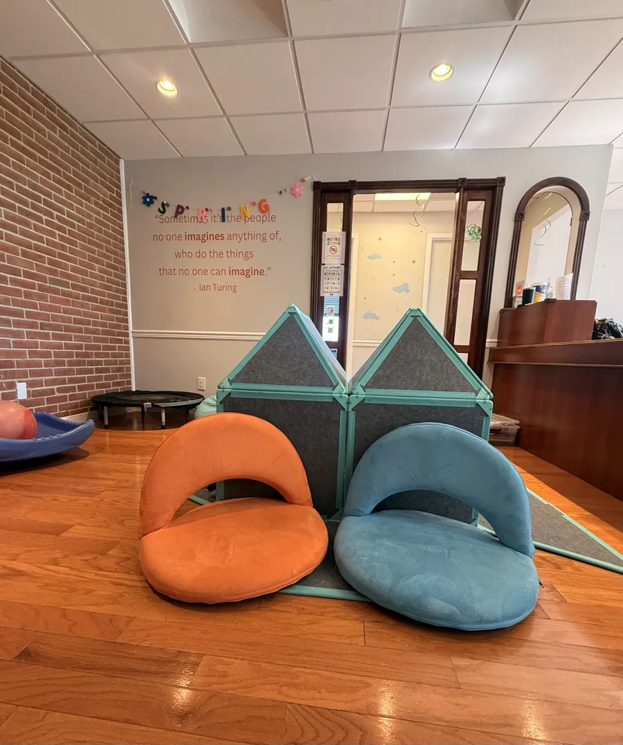 Room with soft foam climbing shapes and floor cushions